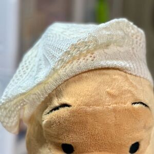 white crocheted bucket hat